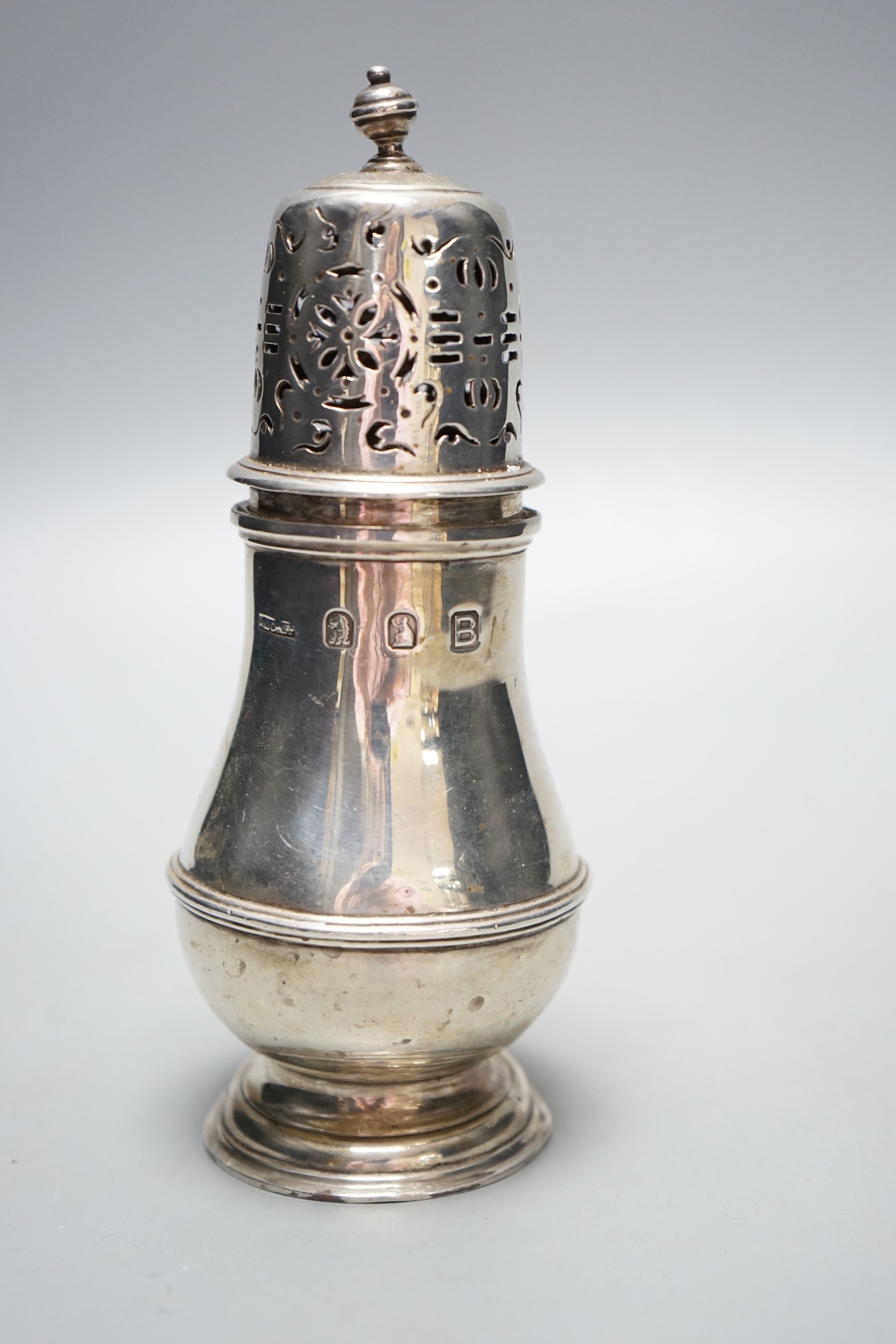 A George VI Brittania standard silver sugar caster, by Asprey & Co, London, 1937, 15.5cm, 179 grams.